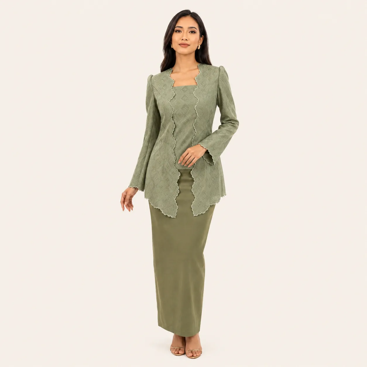 Rimba kebaya in sage brocade with scalloped lace trim and olive skirt