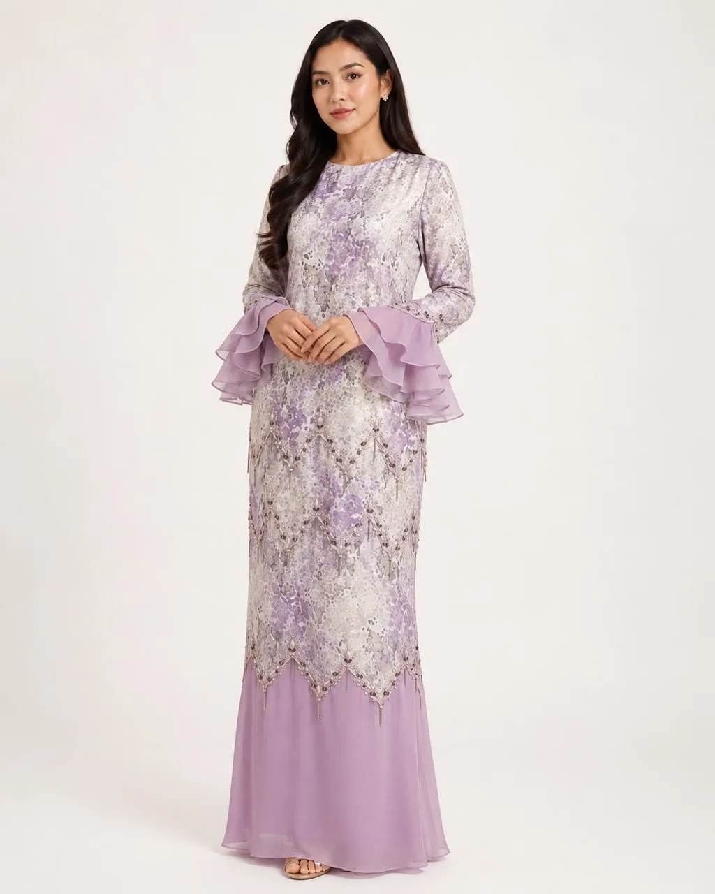Puspita kebaya in lavender lace with chiffon ruffle sleeves and beaded hem