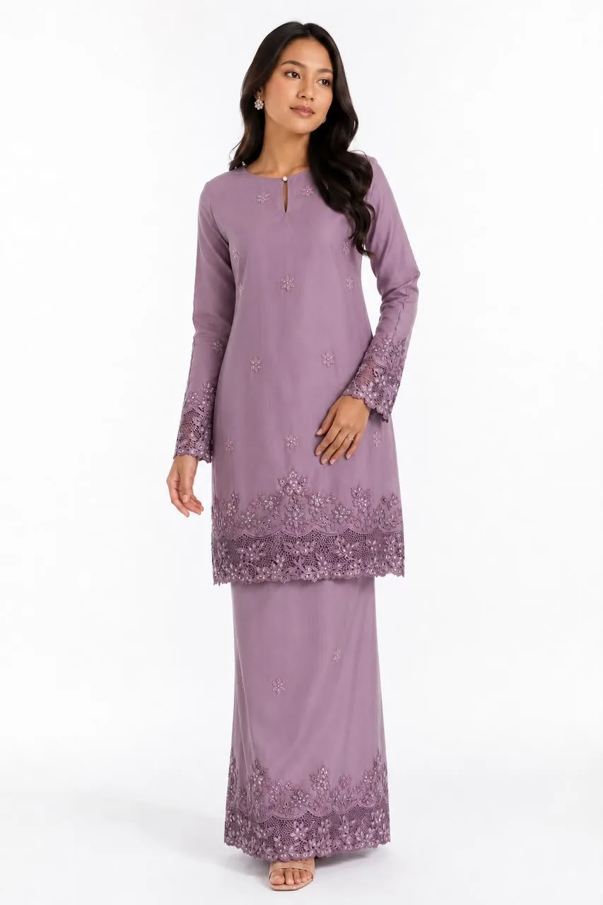 Tonal lace cutwork on a mauve silk kurung