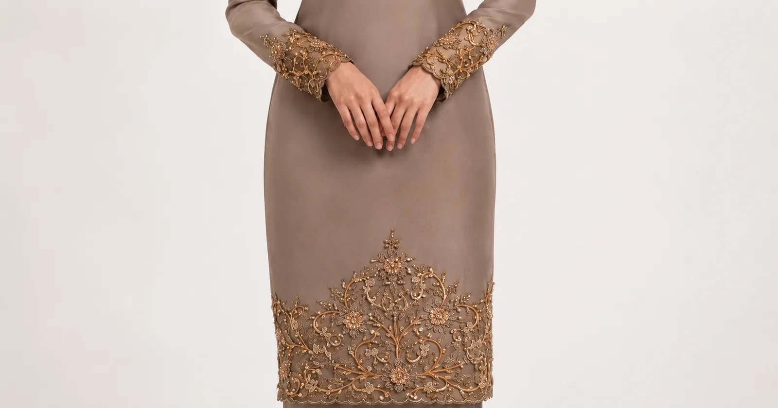 Close-up of hand-sewn beading on a Damak Ilham bespoke piece